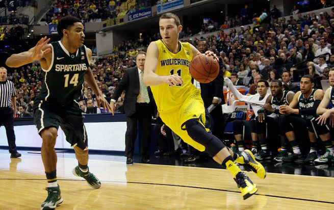 Michigan guard Nik Stauskas, right, has had his draft stock rise considerably after starring for the Wolverines this season.
